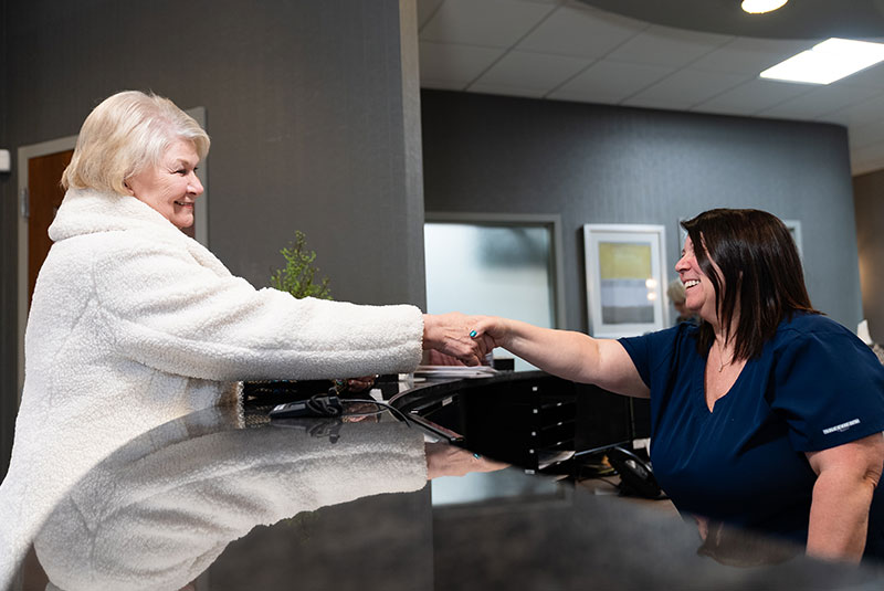 doctor shaking paitents hand