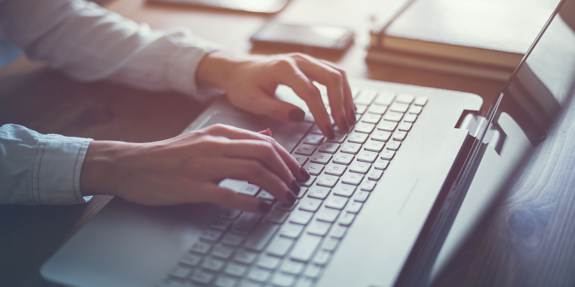 woman typing on computer