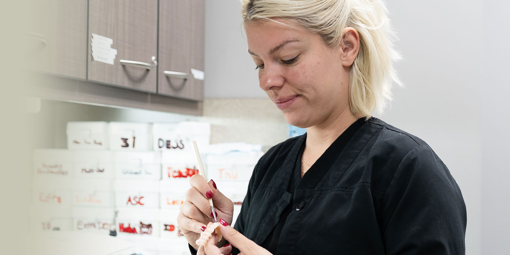 team member working on full mouth implants