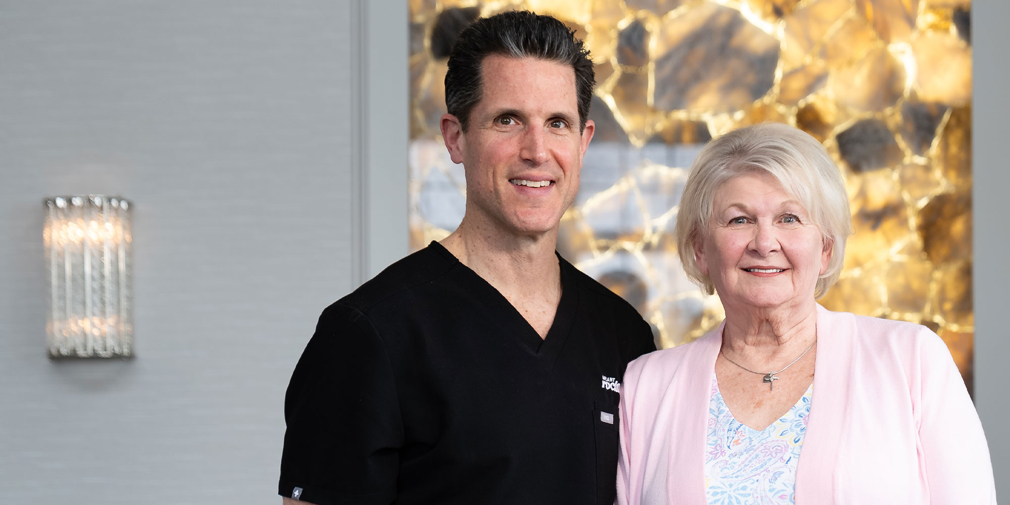 Doctor smiling with patient