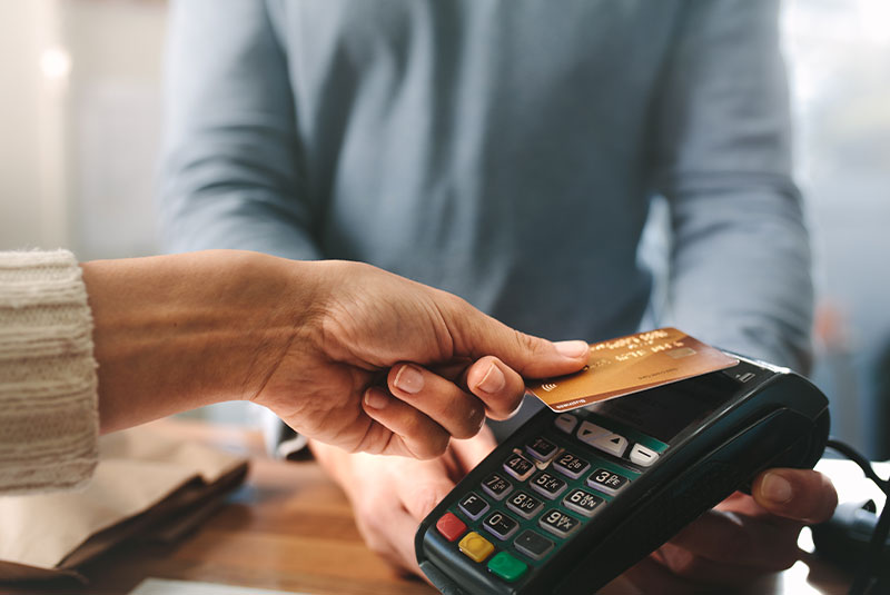 man using credit card