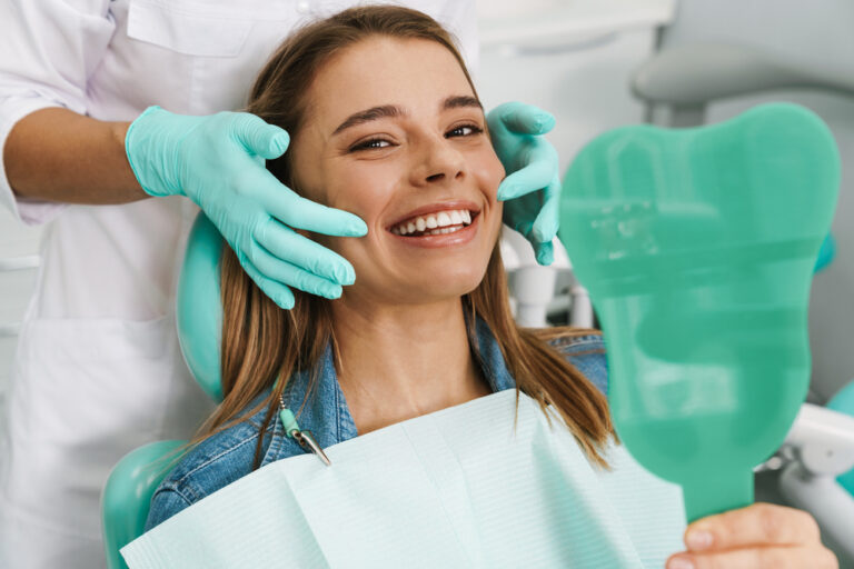 Patient consulting with a dentist in a modern office setting