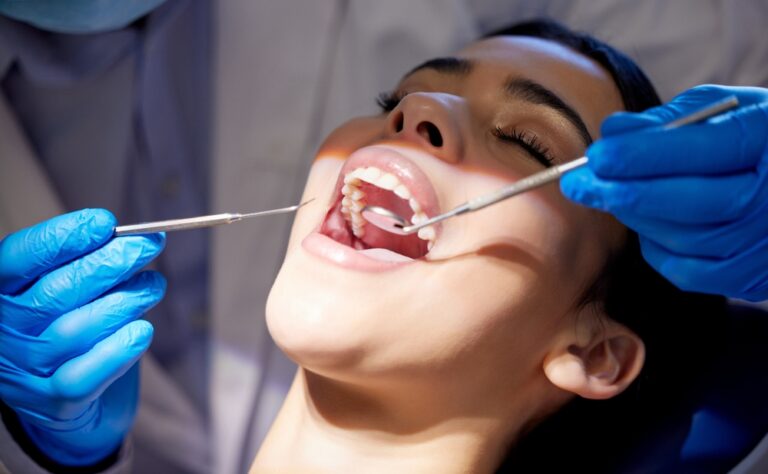 Dentist consulting with a patient on tooth extraction preparation
